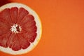 Sliced Ã¢â¬â¹Ã¢â¬â¹grapefruit on a orange background